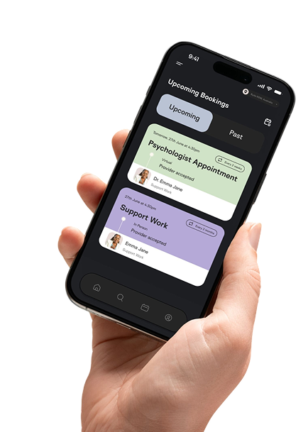 A hand holding a phone displaying the CARED app on the upcoming bookings page.
