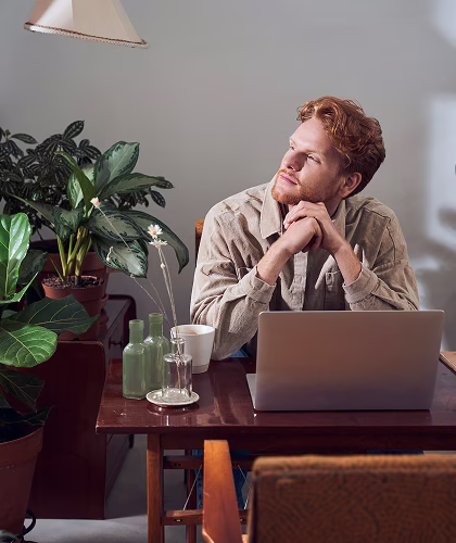 A person at home considering a decision